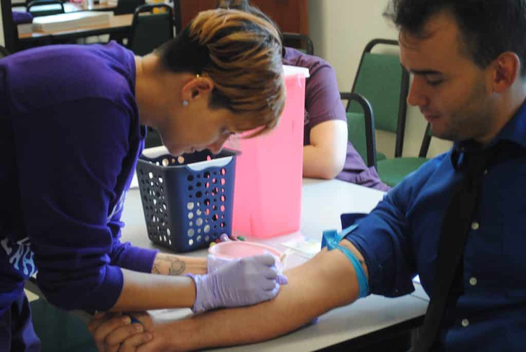 Miami Medical Assisting Students Practice Phlebotomy - Keiser University